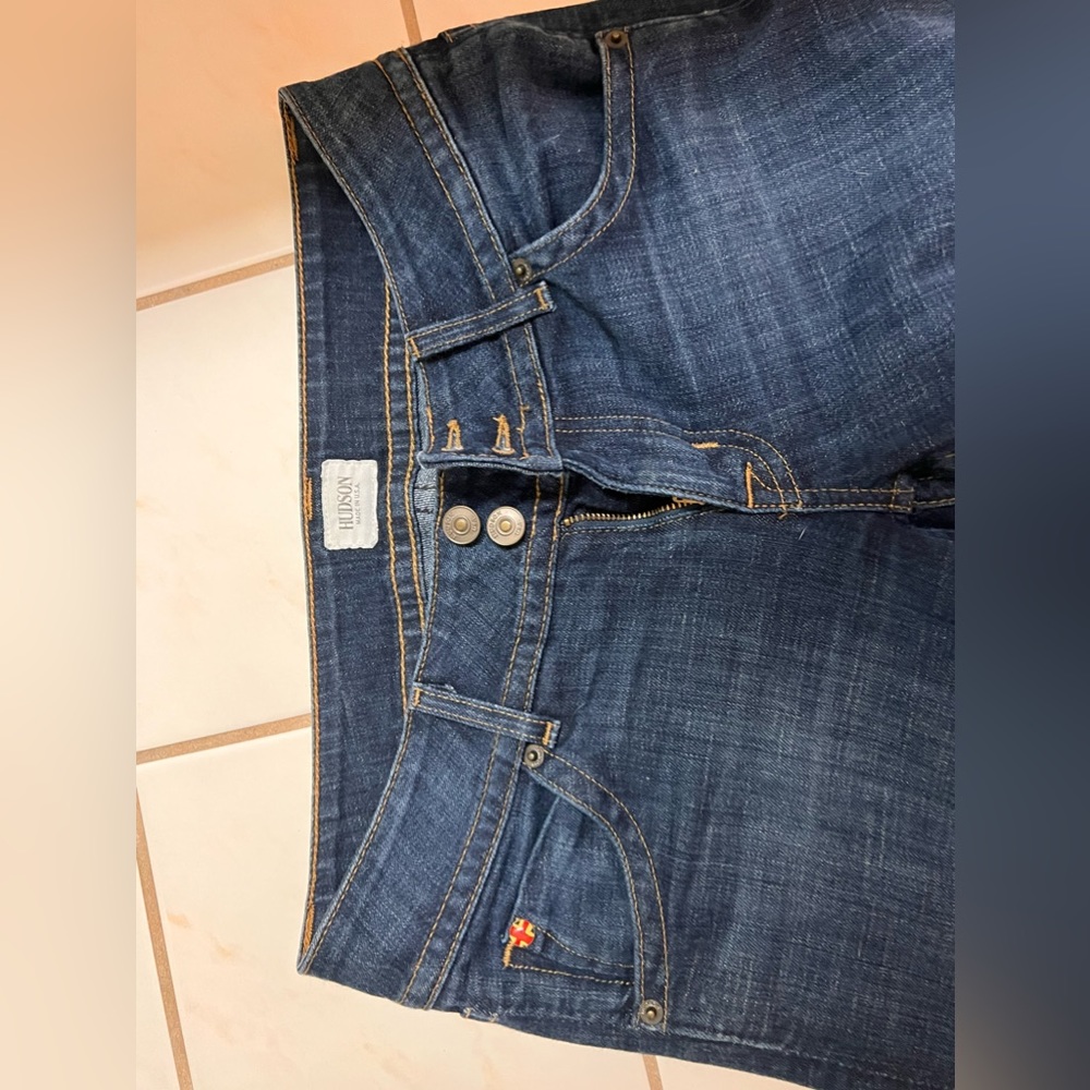 sized as 27 but fit more like 26. perfect low rise flare jeans